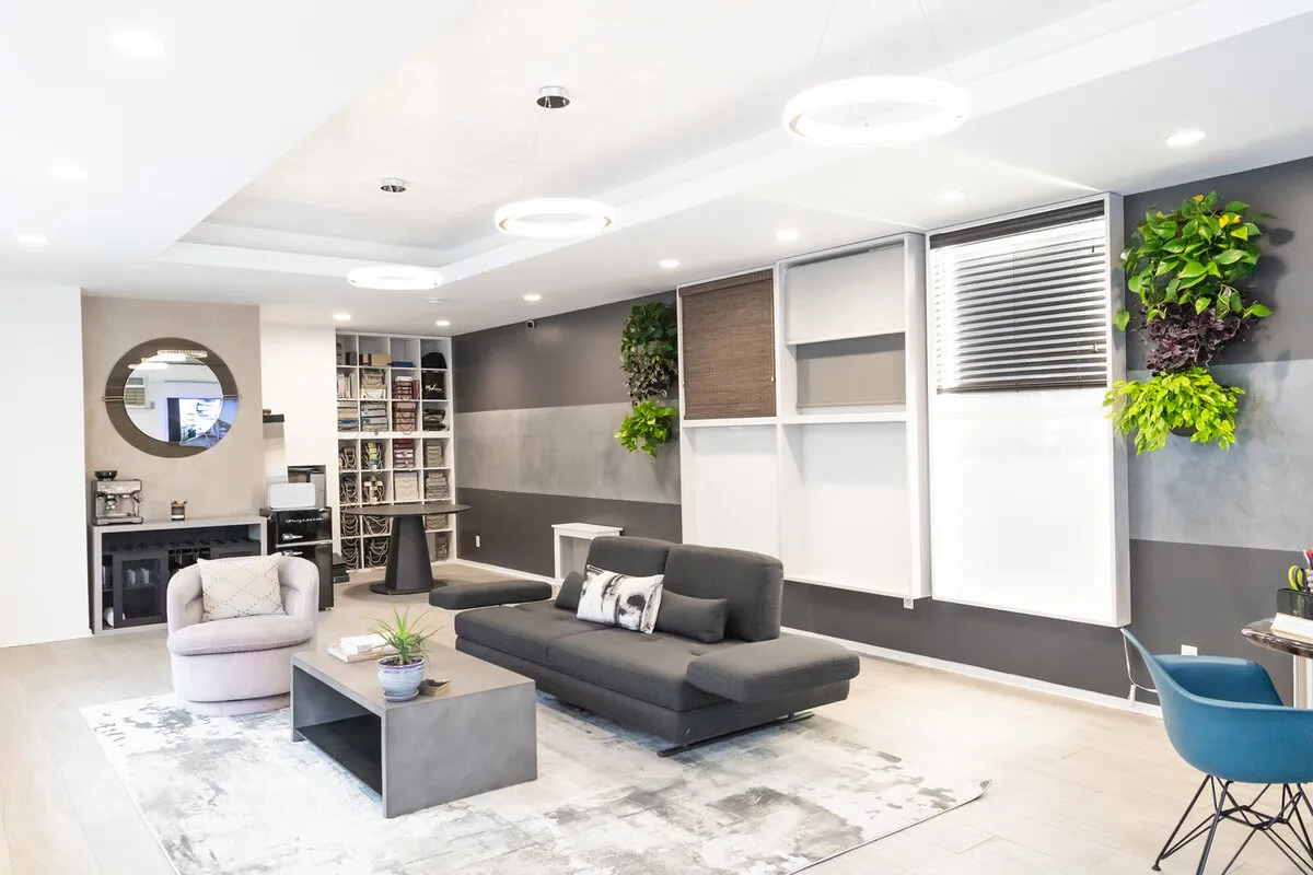 Retail design showroom interior with display wall and seating area